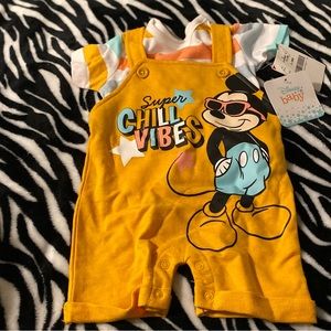 Yellow mickey mouse two piece outfit. Will come washed if requested